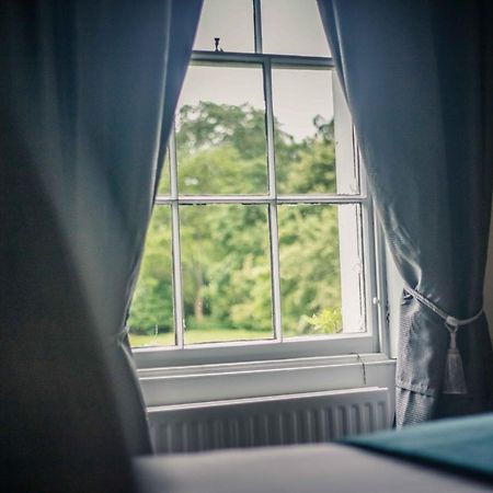 Caistor Hall Arminghall Extérieur photo